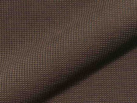 Polsterstoff Mondo auf dem Bild ist zu sehen mit markanter Struktur und dichter Oberfläche für strapazierfähige Sitzmöbel.