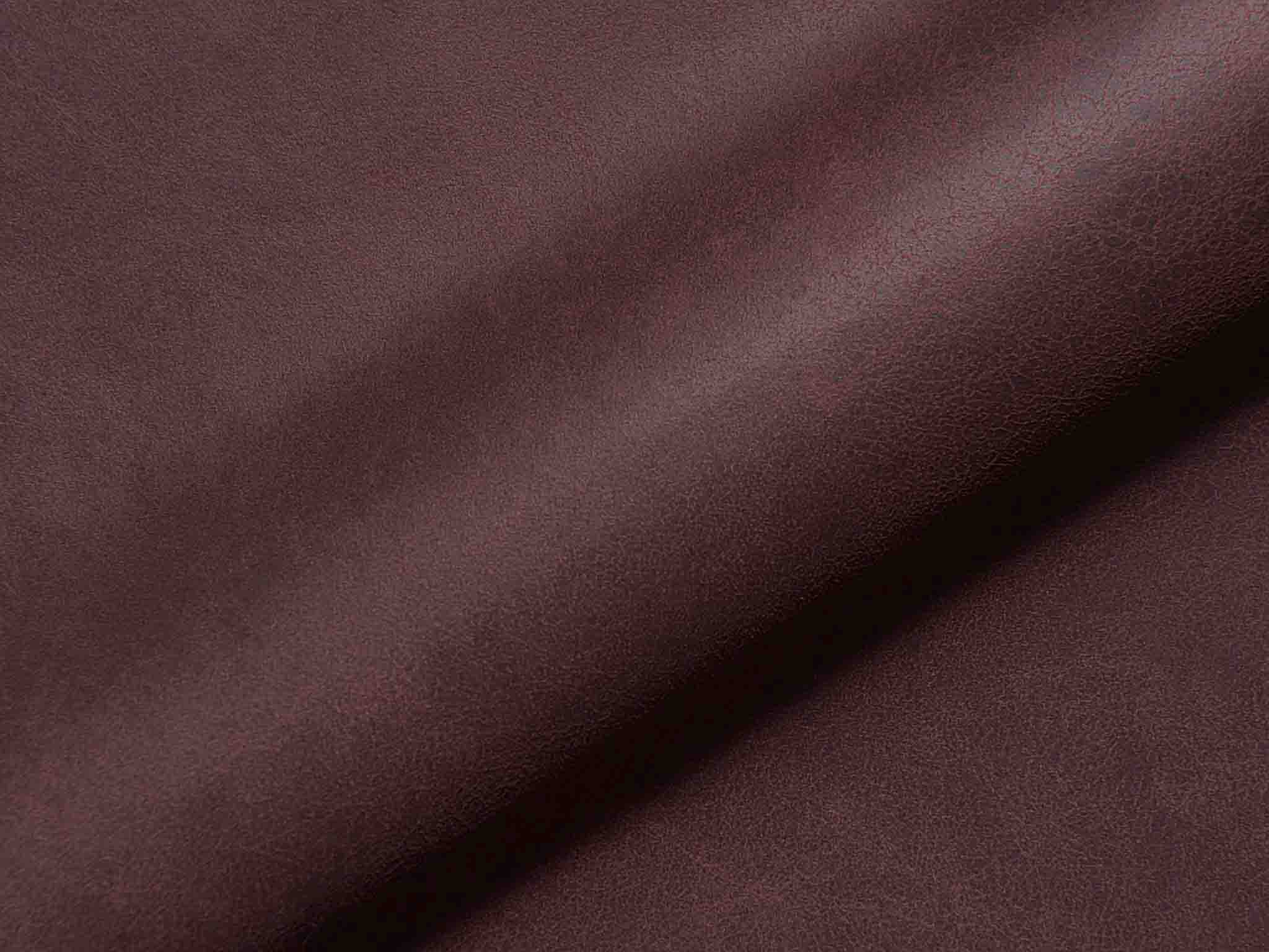 Polsterstoff Aurelio 1412 als Detailbild mit griffiger Oberfläche, feiner Narbung und natürlichem Faltenwurf.