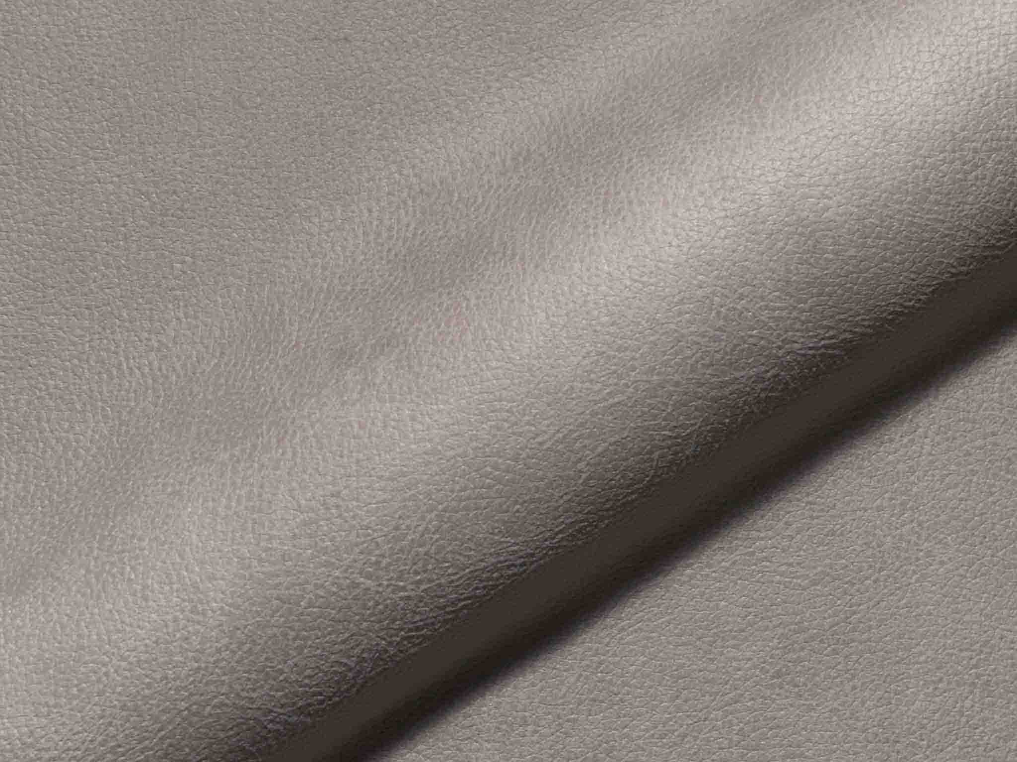 Polsterstoff Sella 1504 mit charaktervoller Lederoptik, feiner Narbung und robuster Oberfläche, pflegeleicht und geeignet für hochwertige Polstermöbel.