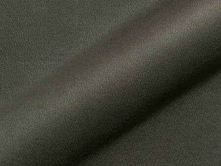 Polsterstoff Utori 1317 mit markanter Lederoptik und feiner Narbung, widerstandsfähig und pflegeleicht für Polster.