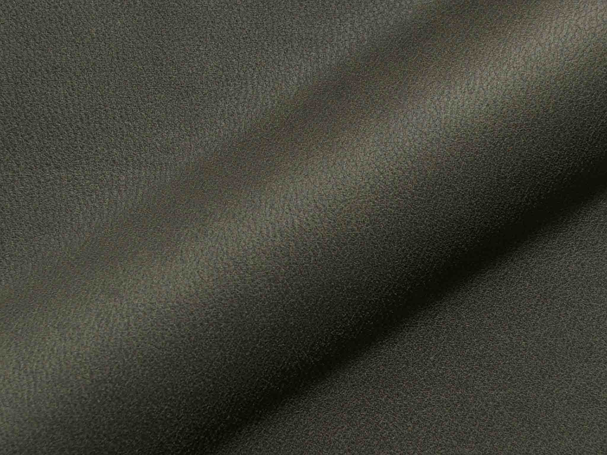 Polsterstoff Utori 1317 mit markanter Lederoptik und feiner Narbung, widerstandsfähig und pflegeleicht für Polster.