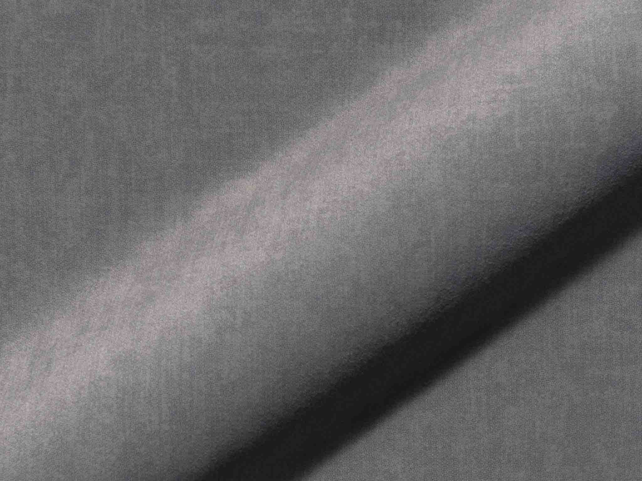 Detailaufnahme Polsterstoff Sari 419: unifarbener Möbelstoff in Mittelgrau mit Veloursoptik, weich fallend, fein strukturiert und mit samtigem Flor
